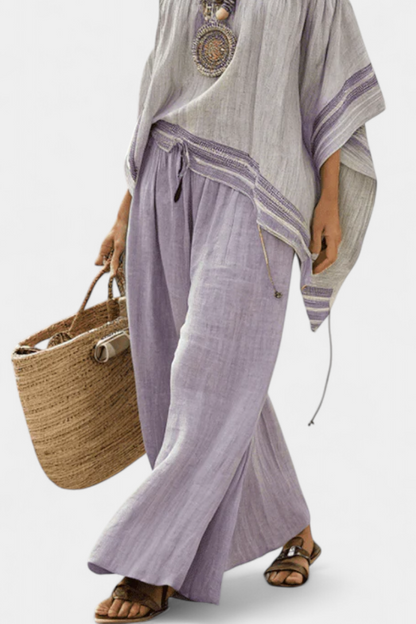 Zandrel | Elegante top off-shoulder e pantaloni a righe a gamba larga